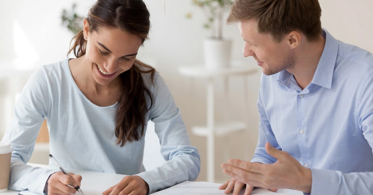 students studying with tutor